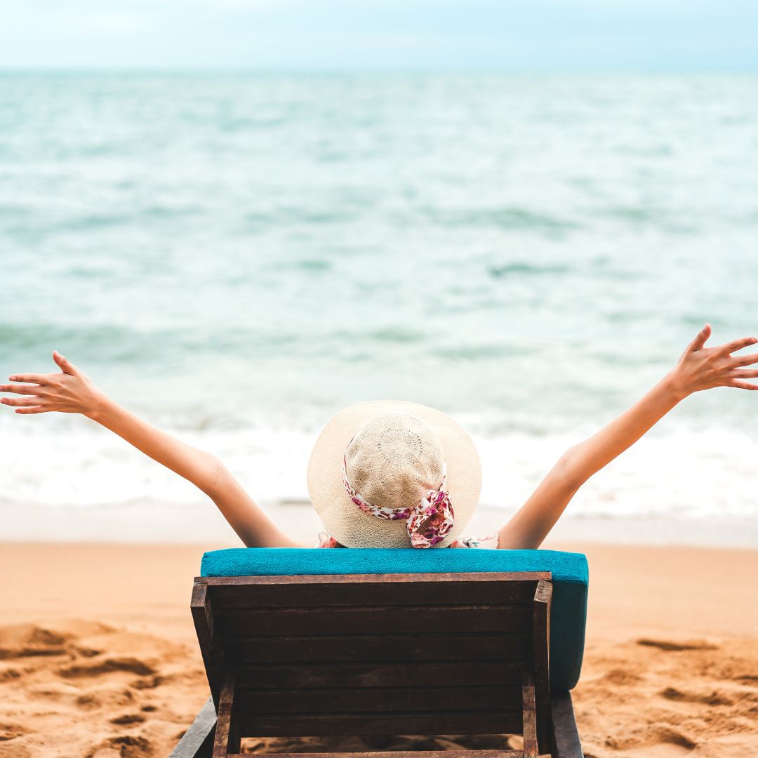 person sitting on beach