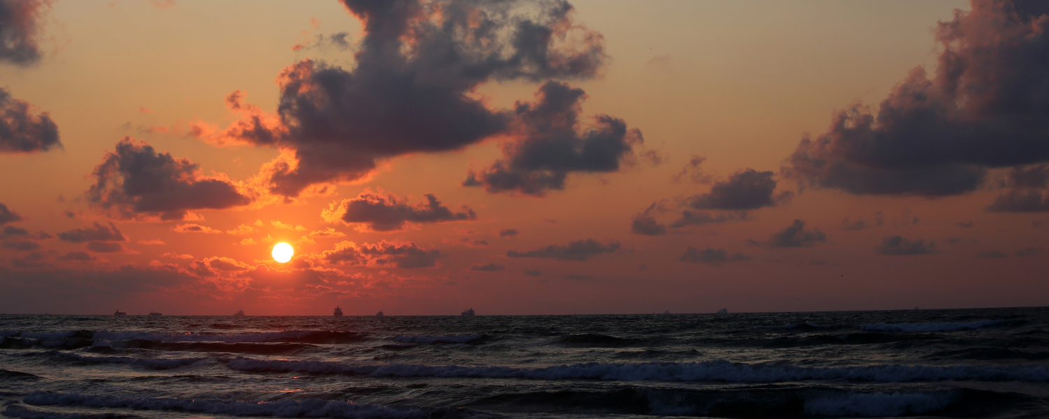 orange sun over ocean